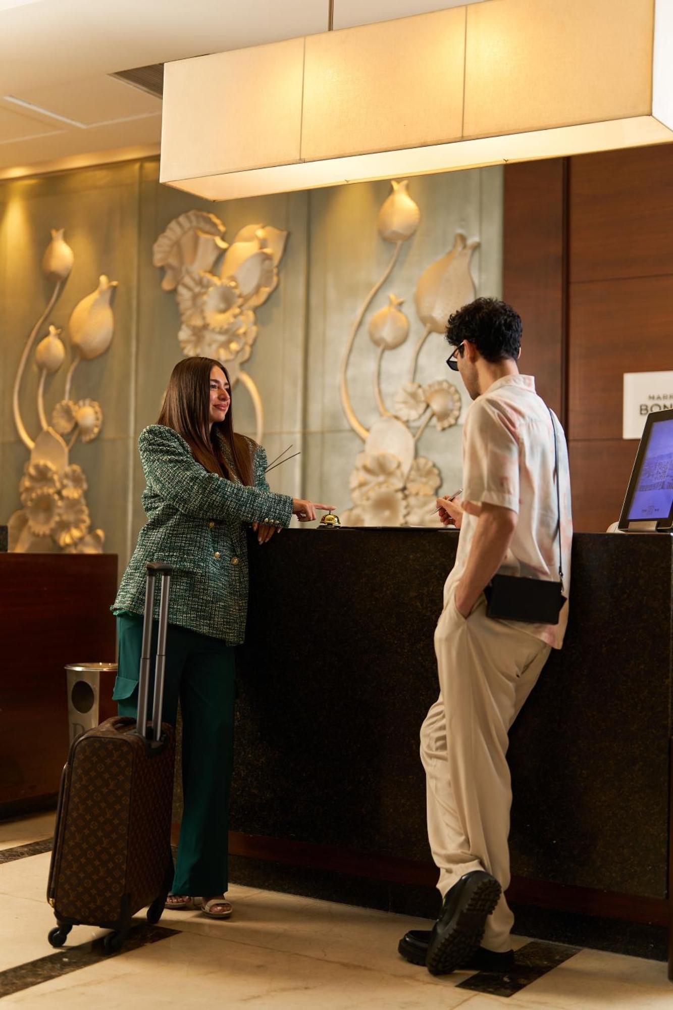 Renaissance Cairo Mirage City Hotel Εξωτερικό φωτογραφία A hotel receptionist